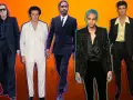 Fünf Männer in schicken Anzügen, die den dresscode cocktail perfekt umsetzen. Von klassisch bis extravagant ist alles dabei.