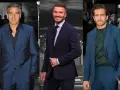 George Clooney, David Beckham und Jake Gyllenhaal in blauen Anzügen. Welches Hemd passt am besten? Clooney trägt ein schwarzes Hemd, Beckham ein gestreiftes Hemd mit Krawatte, Gyllenhaal ein dunkles grünes Hemd.