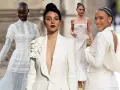 Vier Frauen in eleganten weißen Outfits, inspiriert für den Standesamt-Look. Spitze, Blazer und Kleider in Creme-Tönen.