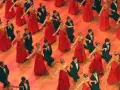 Junge Paare in roten Kleidern und schwarzen Anzügen tanzen. Die Kleiderordnung der Semperoper wird hier elegant umgesetzt.