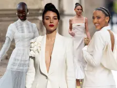 Vier Frauen in eleganten weißen Outfits, inspiriert für den Standesamt-Look. Spitze, Blazer und Kleider in Creme-Tönen.