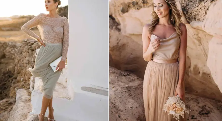 Zwei Frauen in eleganten Kleidern, bereit für die Hochzeit der Tochter. Eine trägt ein glitzerndes Oberteil und einen mintgrünen Tüllrock, die andere ein champagnerfarbenes Top und einen bodenlangen Tüllrock mit Brautstrauß.