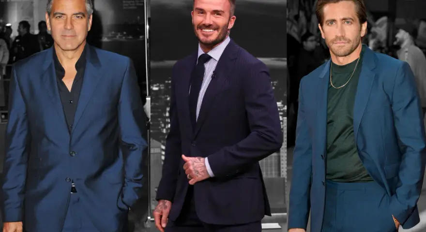 George Clooney, David Beckham und Jake Gyllenhaal in blauen Anzügen. Welches Hemd passt am besten? Clooney trägt ein schwarzes Hemd, Beckham ein gestreiftes Hemd mit Krawatte, Gyllenhaal ein dunkles grünes Hemd.